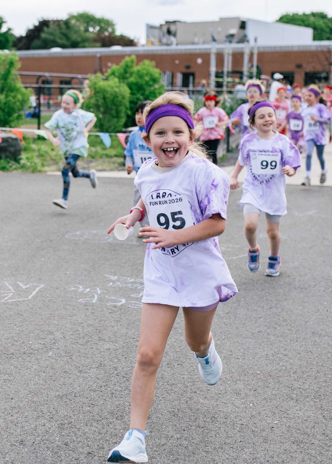 07 - Tie-dyed runners pack Brown School Fun Run, raising more than $31,000